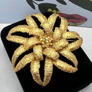 Gold Crepe Sunburst Brooch